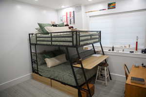 Bedroom featuring recessed lighting  and walk in closet