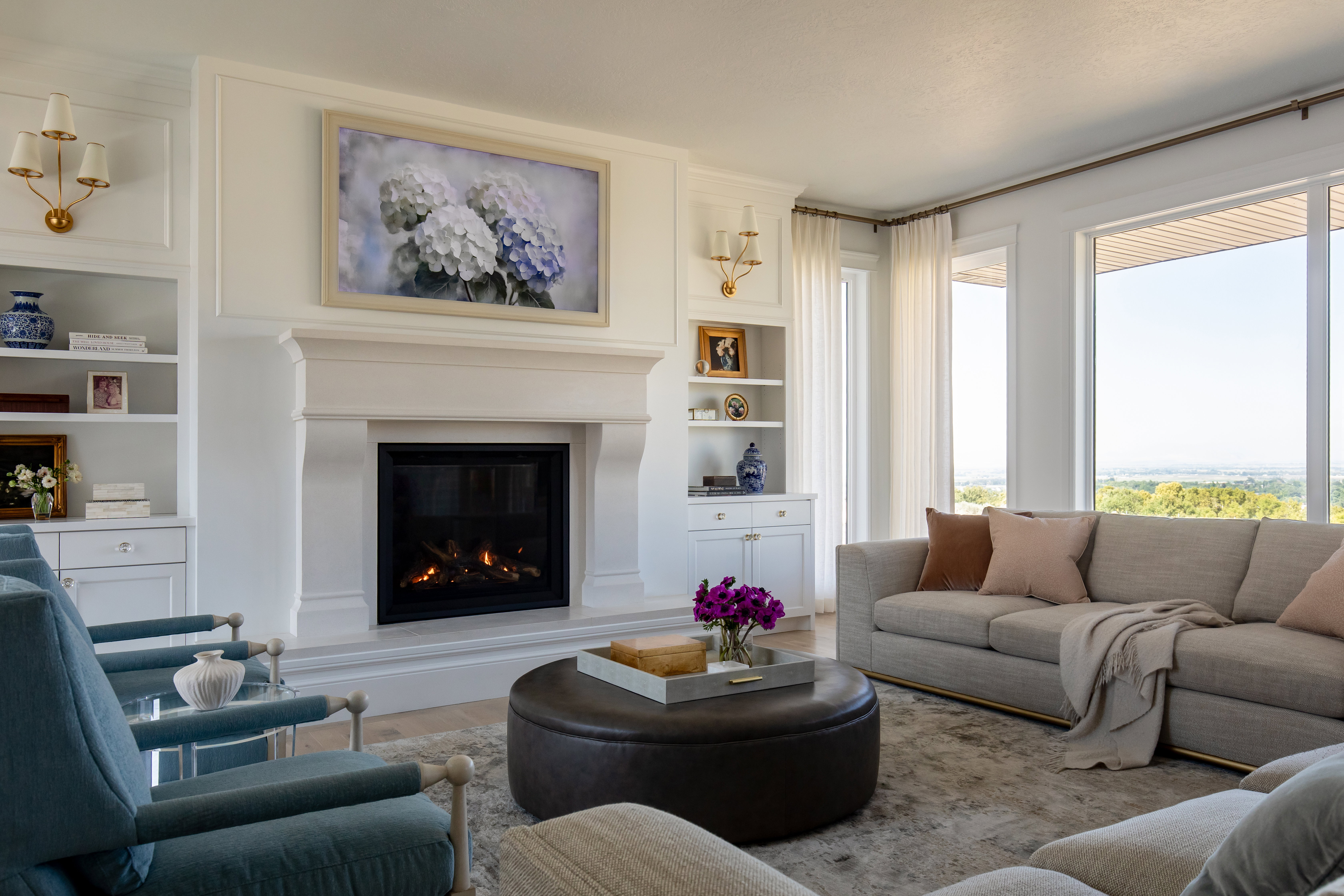 Floor to ceiling windows and gas fireplace