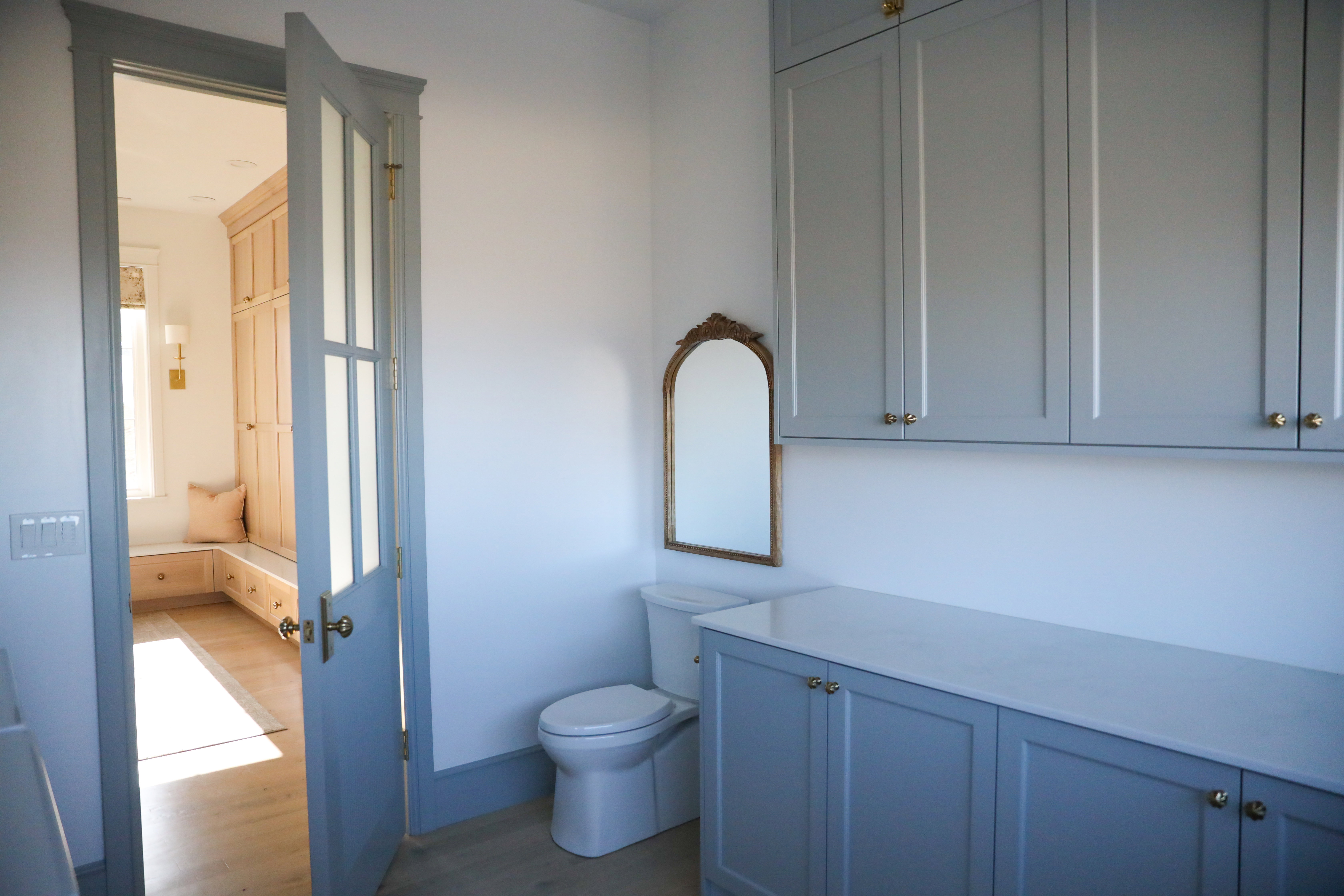 Laundry room with half bath