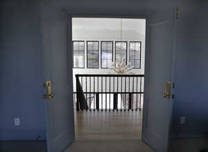 Master bedroom double door entrance looking into entry way
