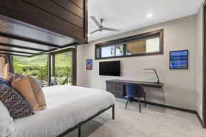 Carpeted bedroom with access to outside, ceiling fan, a desk, and recessed lighting