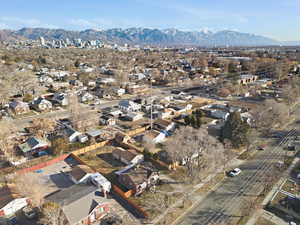 View of property location featuring nearby suburban area and a mountainous background
