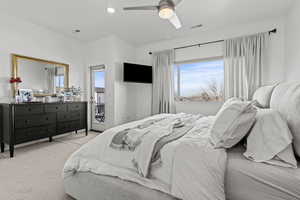 Master Bedroom with carpet flooring, ceiling fan, access to outside, and recessed lighting