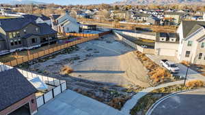 Aerial perspective of suburban area with a mountainous background