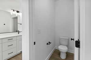 Bathroom with vanity and light wood-style flooring