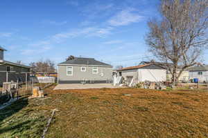 Rear view of property with a patio area