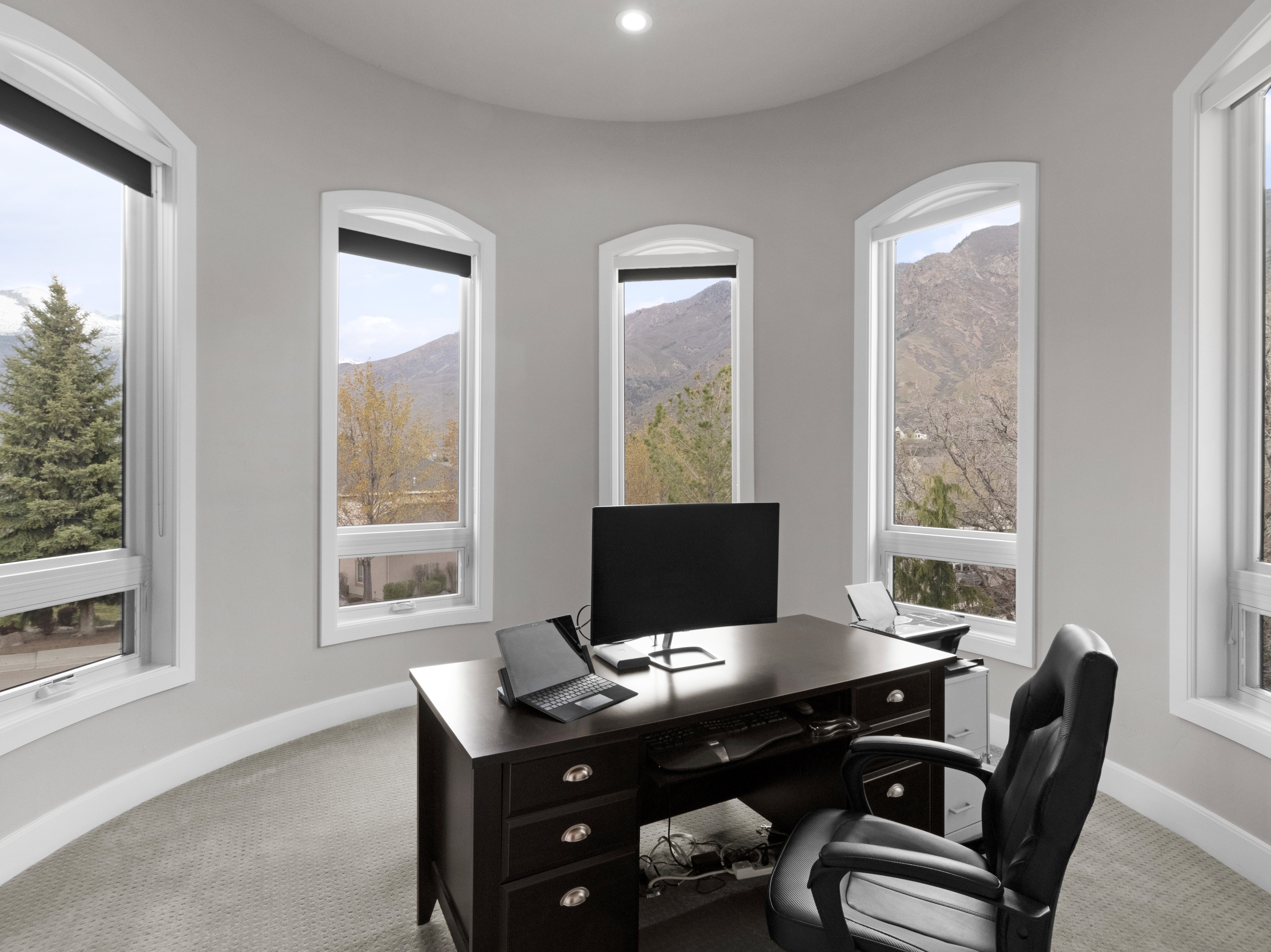 Office area featuring carpet and baseboards