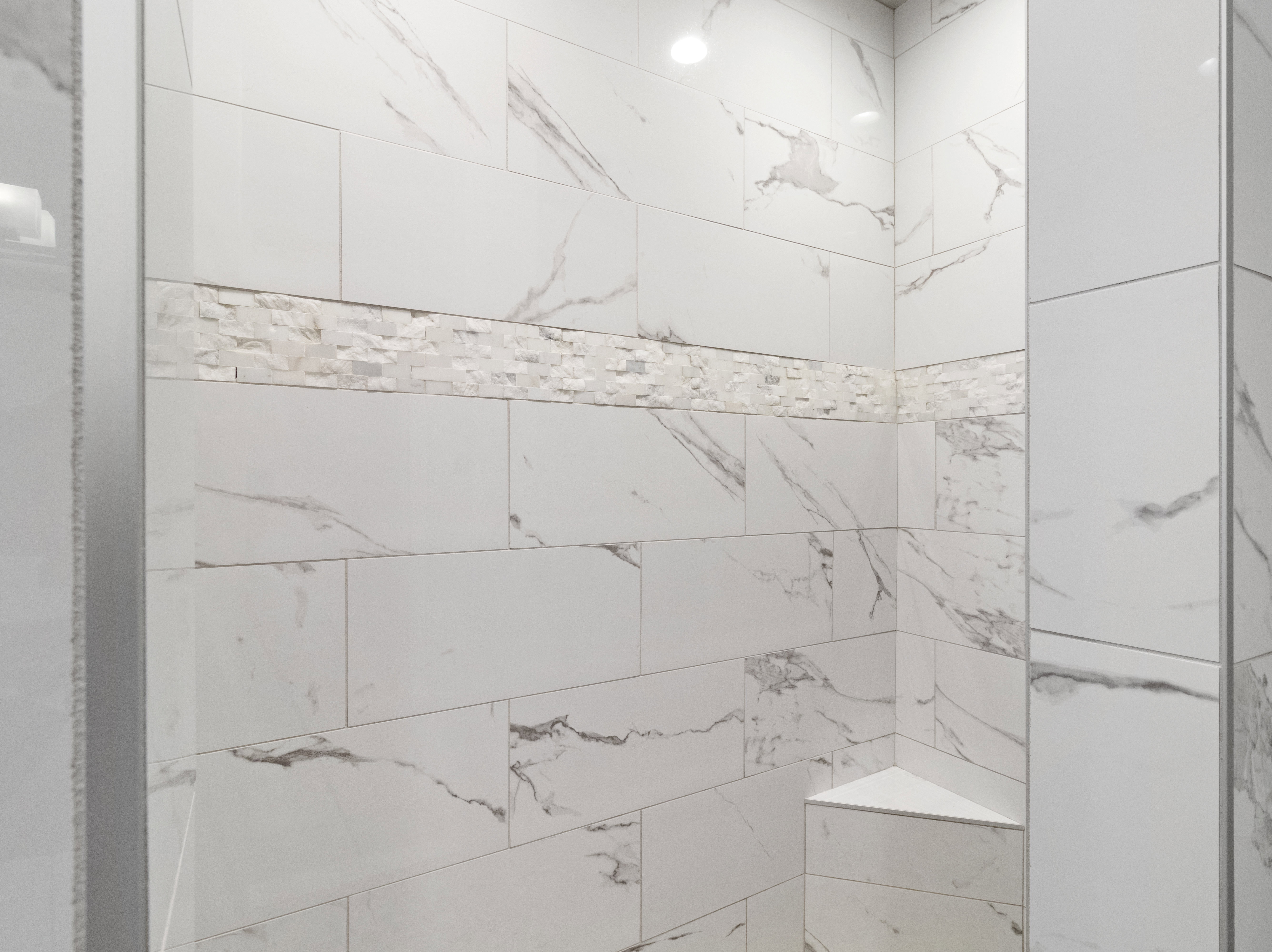 Bathroom view of tiled shower