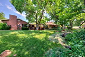 Lush, open backyard. Double lot.