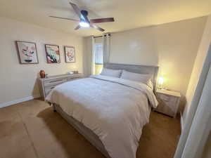 Bedroom featuring carpet floors and ceiling fan