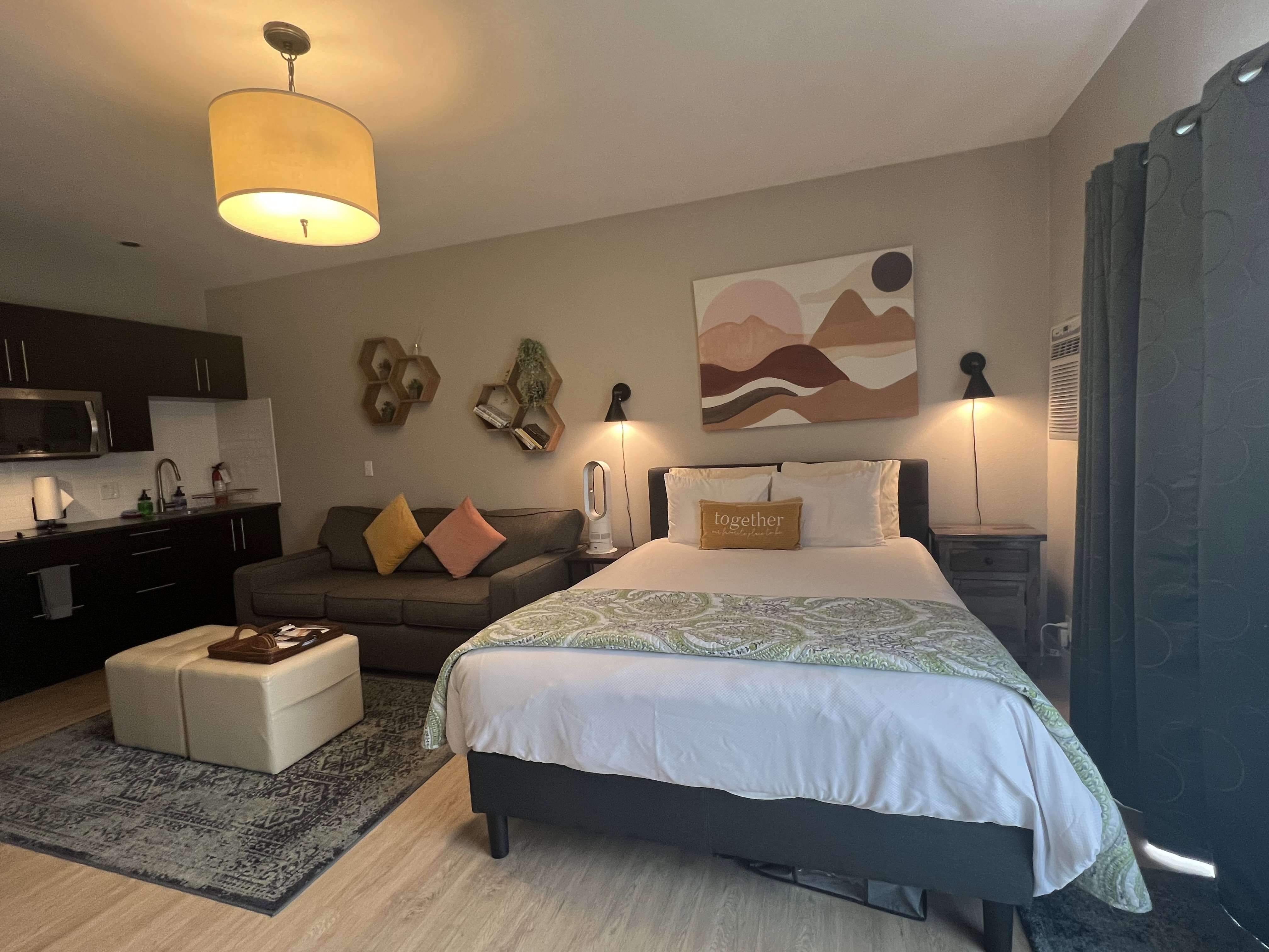 One queen size bed and one twin size pull out couch