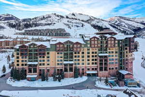 Snowy aerial view with a mountain view