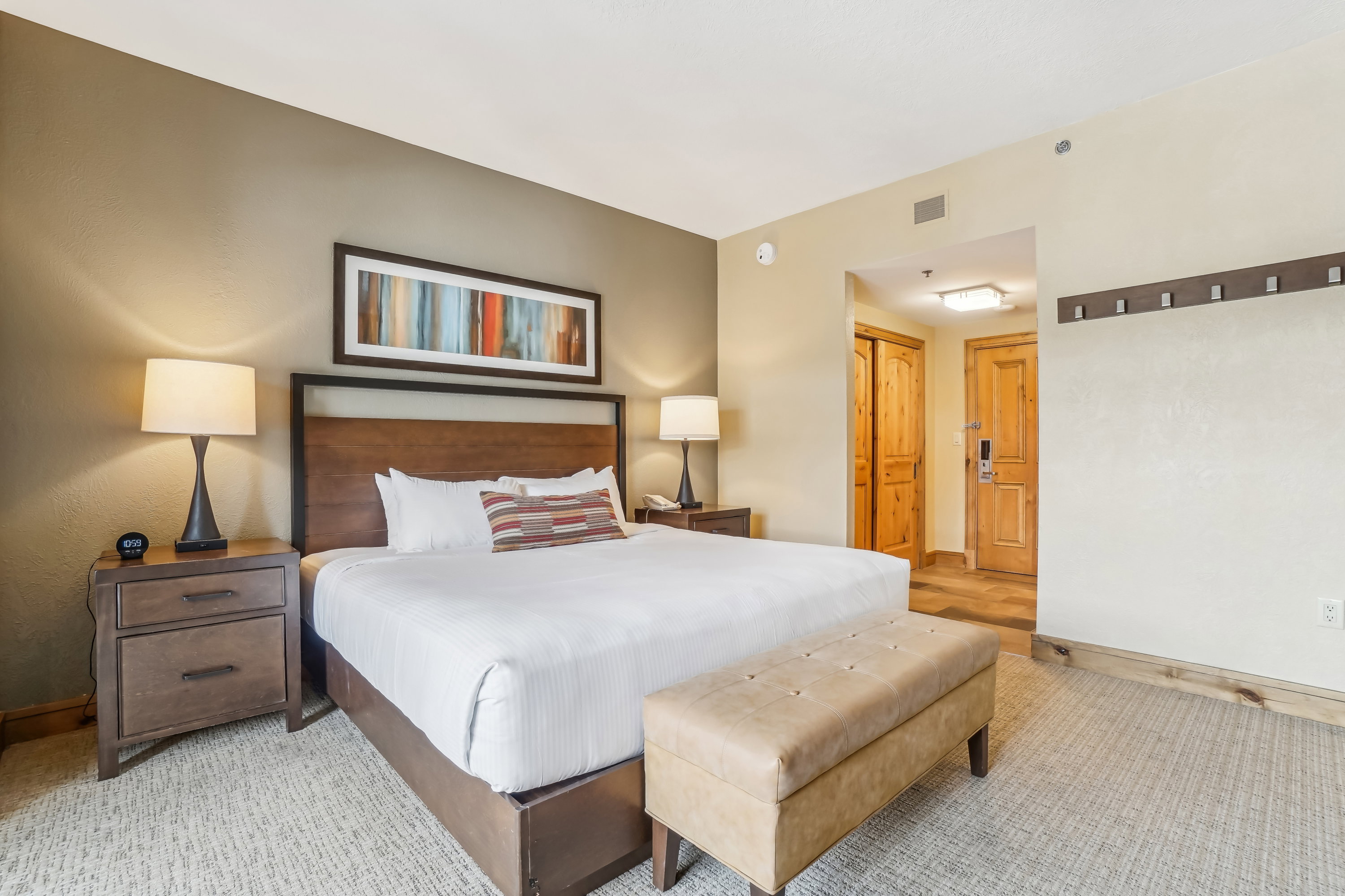Bedroom featuring carpet and a closet