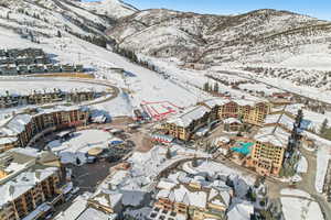 Snowy aerial view with a mountain view