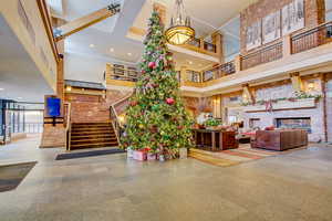 Lobby featuring a high ceiling and recessed lighting