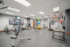 Exercise room featuring a paneled ceiling