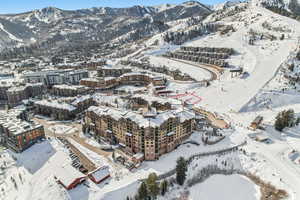Snowy aerial view with a mountain view