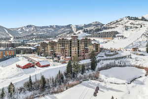 Snowy aerial view with a mountain view