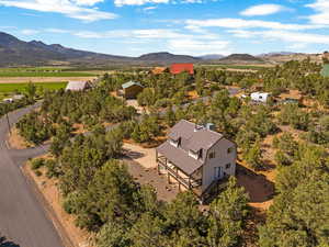 View of subject property featuring a mountain backdrop