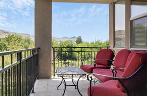 Balcony featuring a mountain view