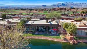 View from above of property featuring a water and mountain view