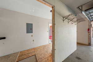 Garage featuring electric panel