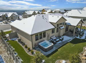 Enhanced photo (Landscape not included) Snowy aerial view with a residential view