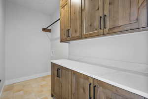 Bar featuring wood finish cabinetry