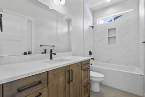 Bathroom with vanity,  shower combination, and light tile patterned floors