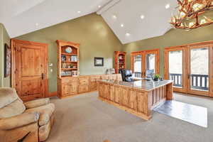 With its own full kitchen, bathroom and administrative assistant's secondary office, this office suite could be a separate dwelling unit