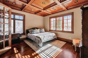 This bedroom off the entryway can be used as an office