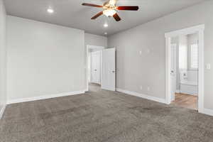Unfurnished bedroom featuring carpet flooring, ceiling fan, and recessed lighting