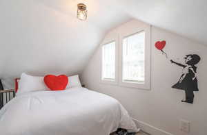 Bedroom featuring baseboards