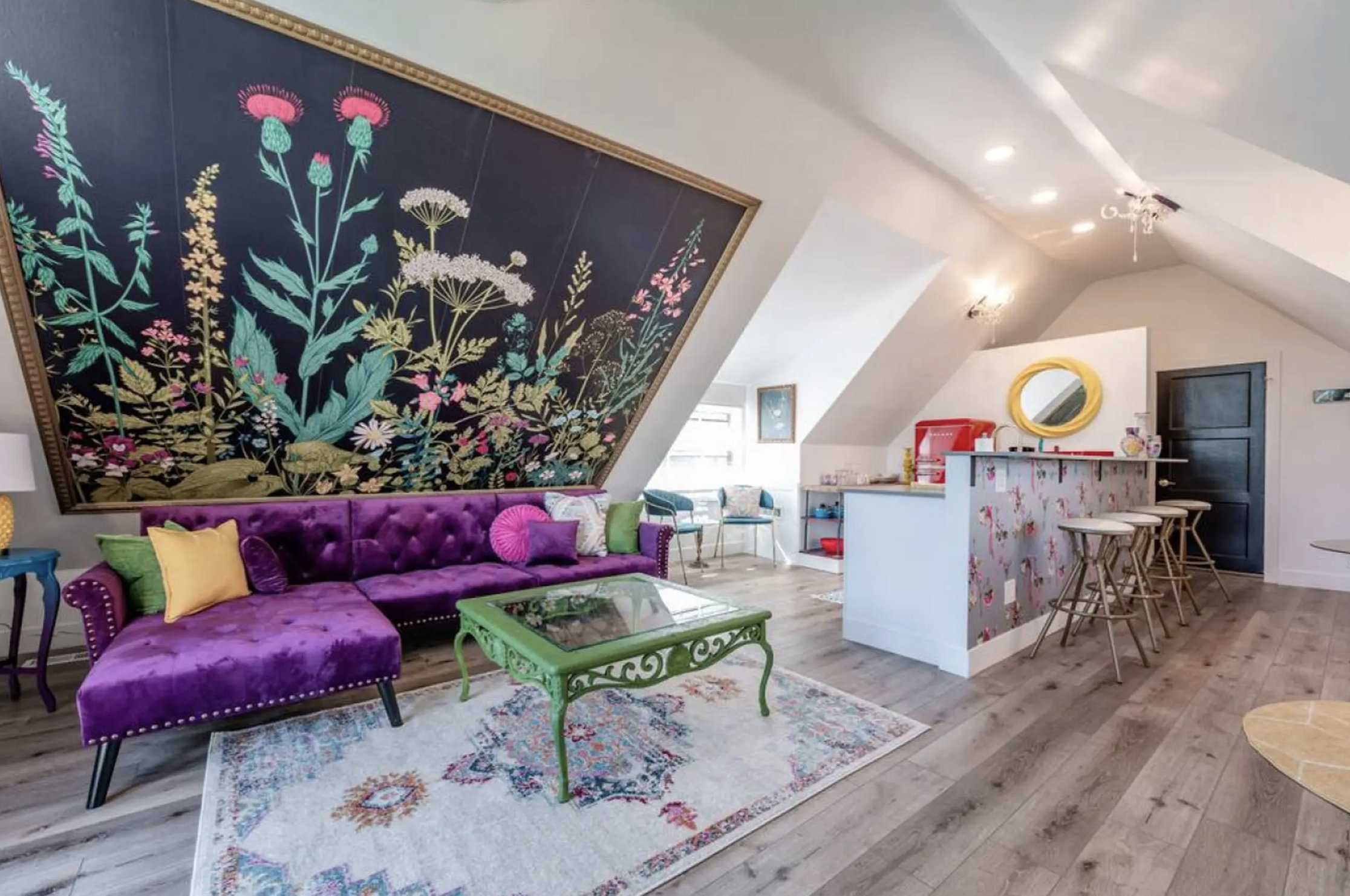 Living area featuring light wood finished floors, recessed lighting, and lofted ceiling