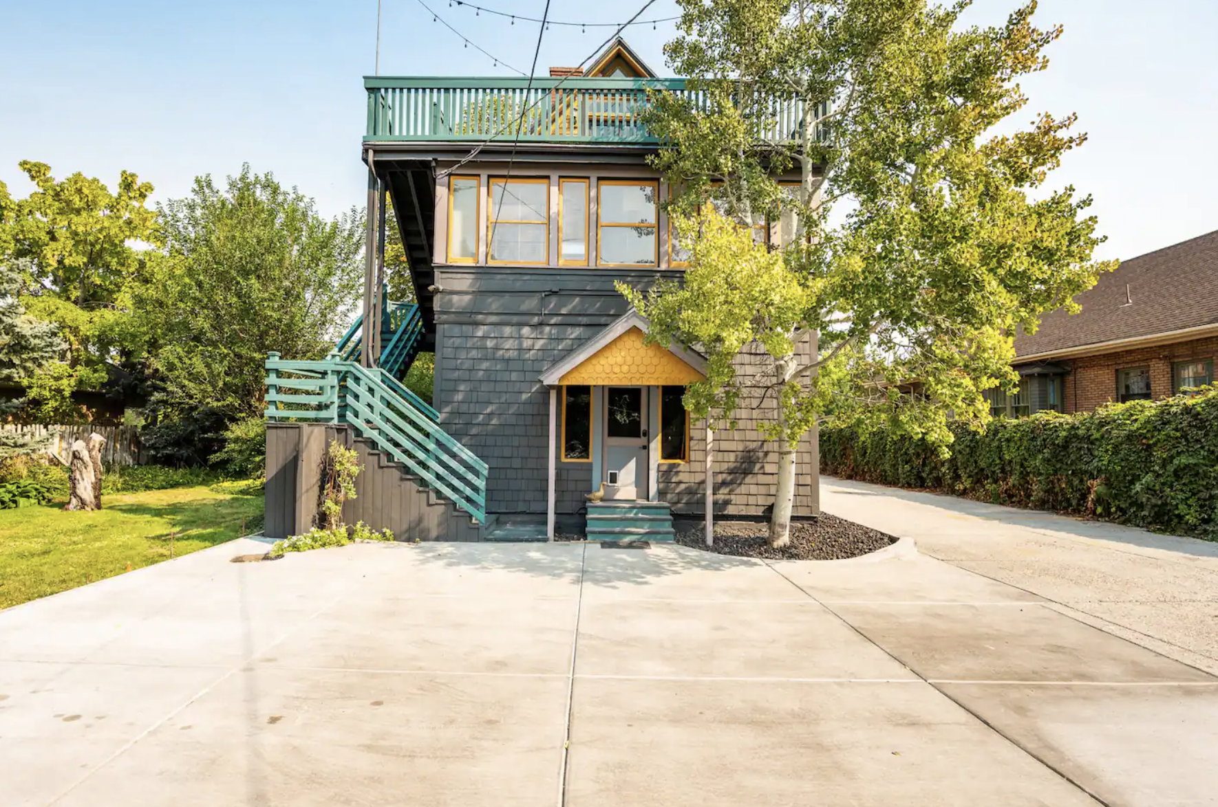 View of front of property featuring concrete driveway