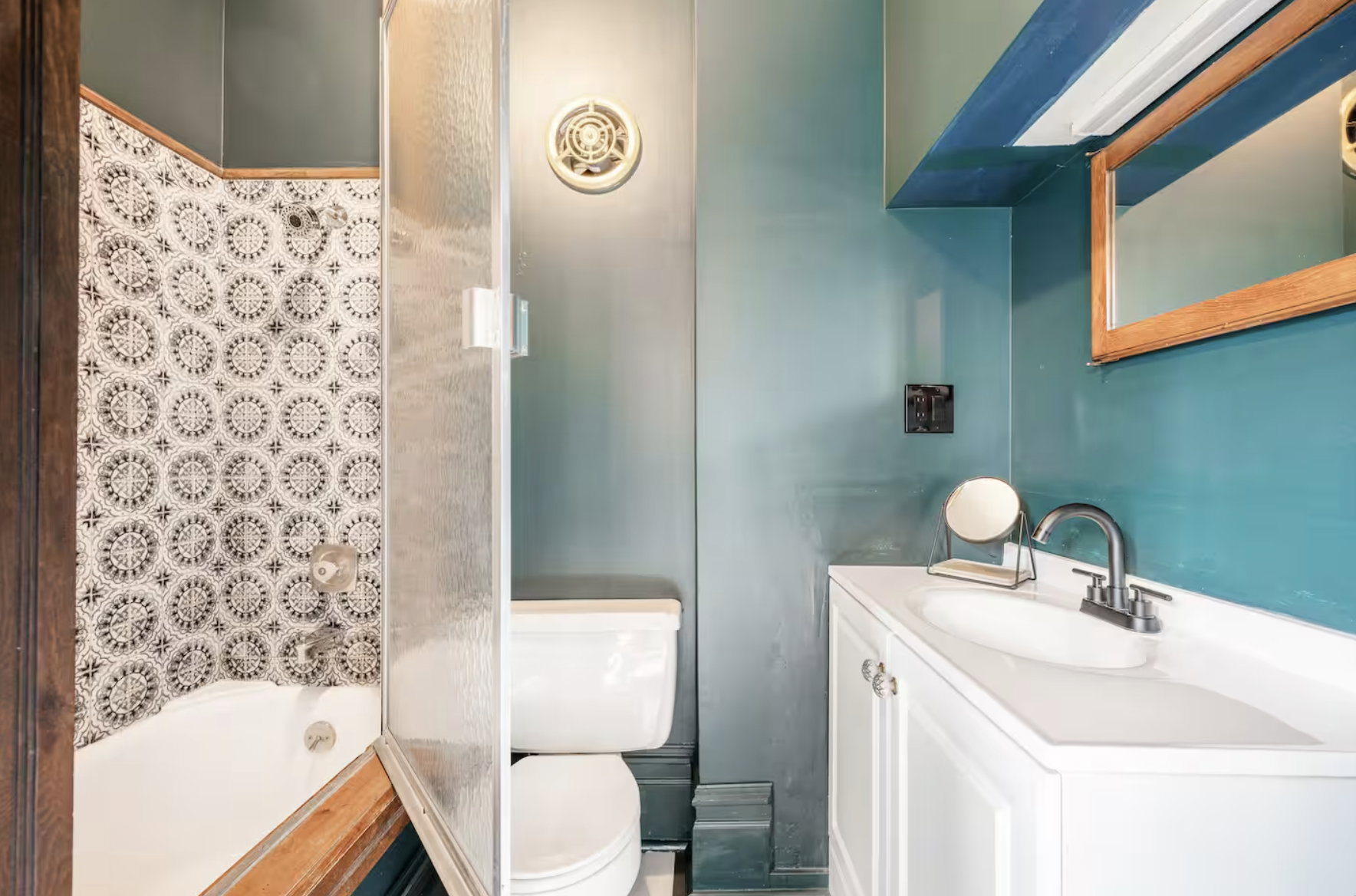 Full bath with vanity and  shower combination