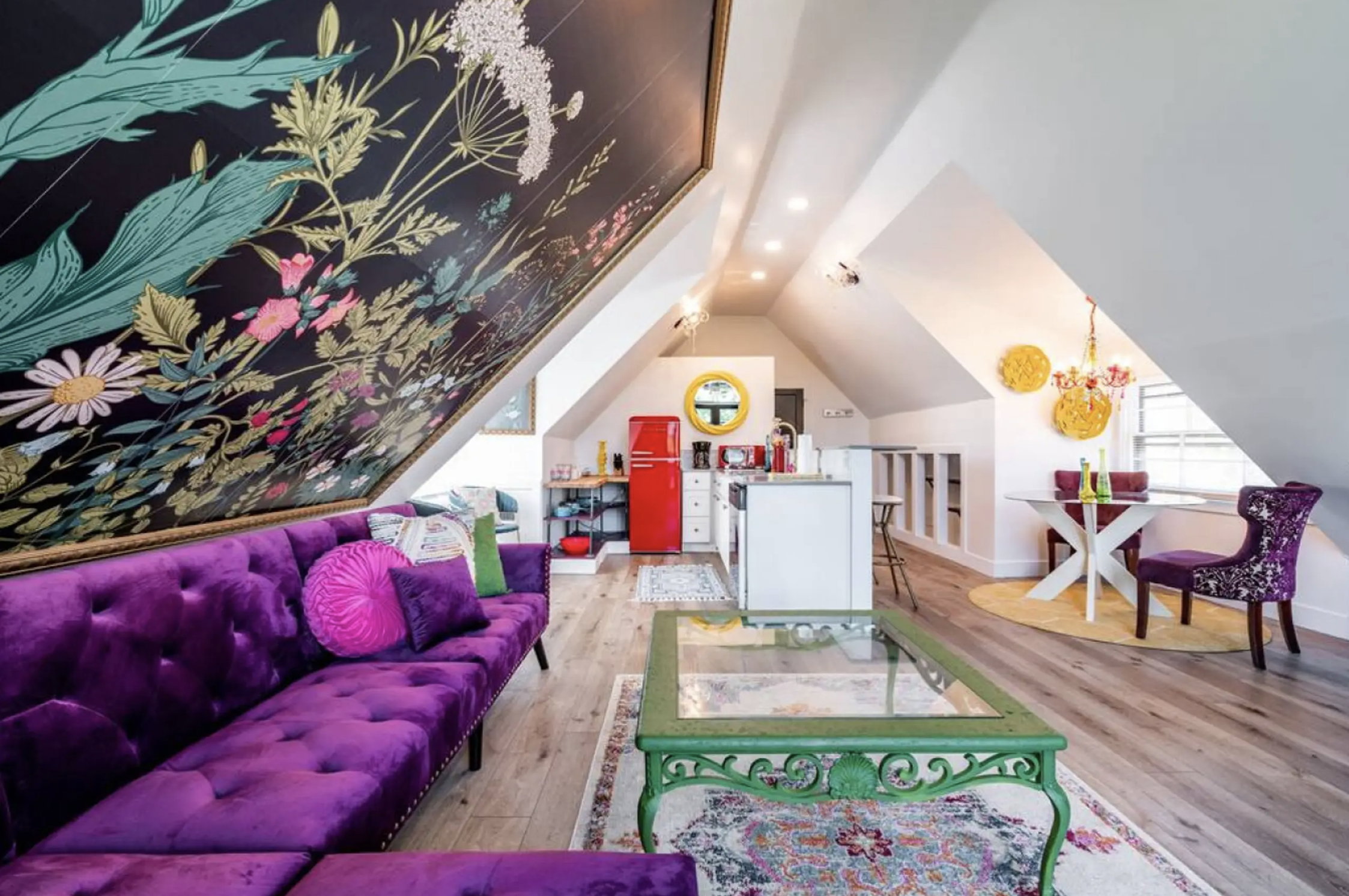 Living room with recessed lighting, vaulted ceiling, and light wood-style floors