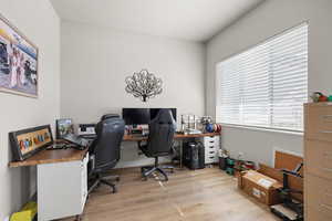 Office with light wood finished floors