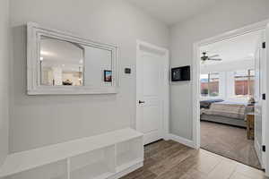 HALLWAY TO LAUNDRY AND PRIMARY BEDROOM