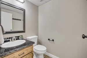 Bathroom featuring vanity and light tile patterned flooring