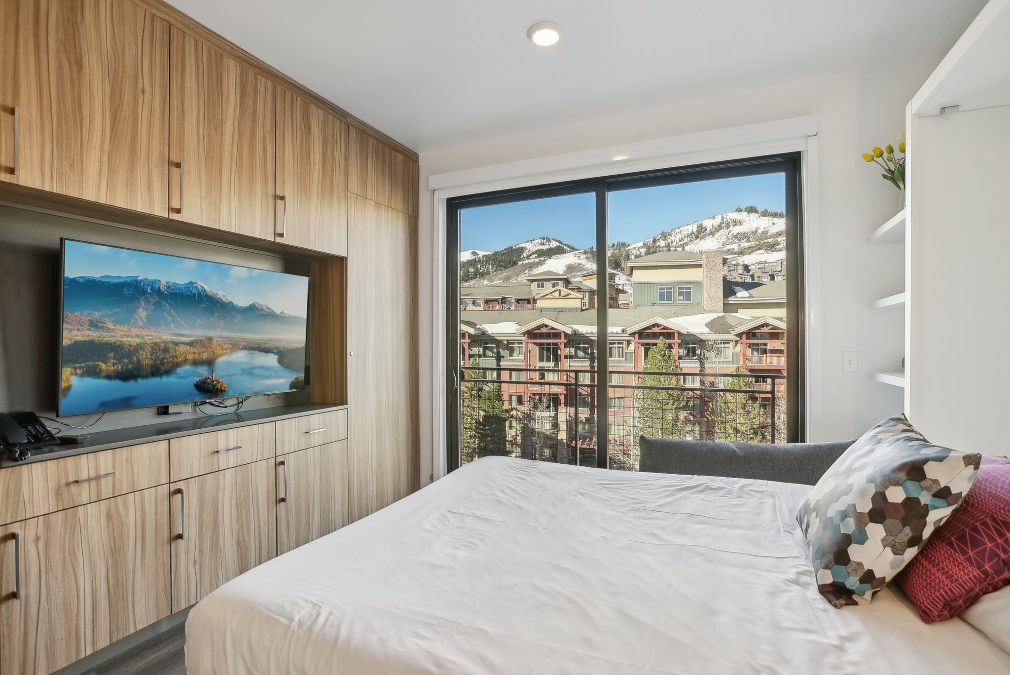 Bedroom featuring recessed lighting and access to outside