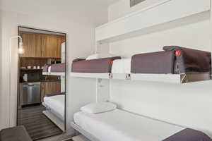 Bedroom with wood finished floors