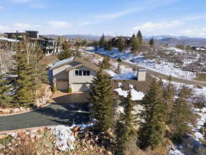 Snowy aerial view with a mountain view