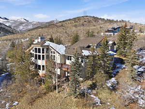 Snowy aerial view with a mountain view