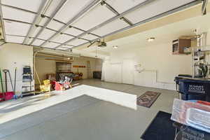 Garage featuring a heating unit