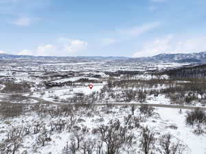 Snowy aerial view with a mountain view