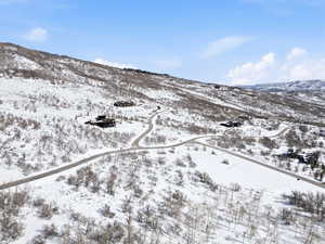 Snowy aerial view with a mountain view