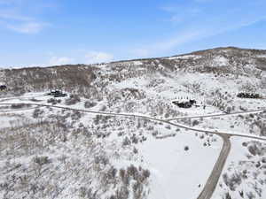 Snowy aerial view with property boundaries highlighted