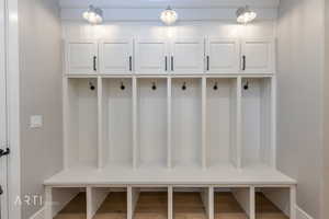 Mudroom with wood finished floors