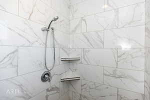 Bathroom view of tiled shower